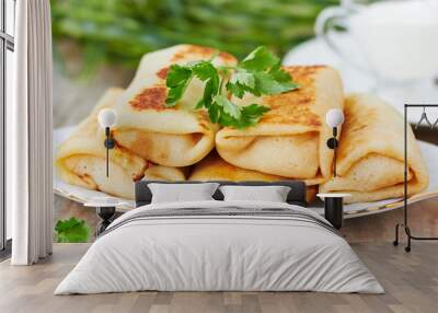 Stuffed pancakes crepes with meat and sauce Wall mural