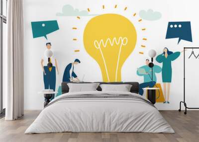 Team of young creative people working together around the light bulb as symbol of generating ideas and making a progress together.  Solving problem, achievement and working in progress concept  Wall mural