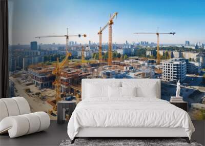 Top view of building construction  site with cranes and industrial machines  Wall mural