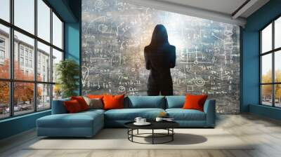 Young woman looking on the black board with mathematical formulas and calculations. Bright idea, way of thinking, discovery and challenge concept.  Wall mural