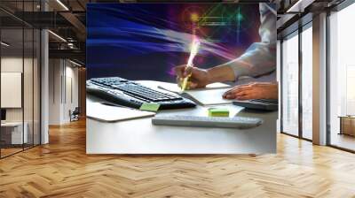 Young woman working in the office. Close up of businesswoman hands holding pen, working on calculator and keyboard, calculate business data. Charts and graphs at the background Wall mural