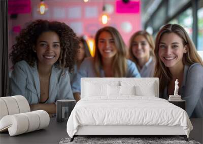 A group of professional women sitting together, chatting and enjoying coffee during a successful business meeting. Wall mural