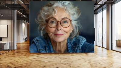 A portrait of an attractive and wise senior grandmother, exuding positivity and happiness. Wall mural