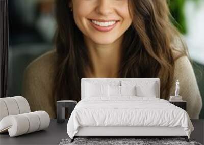 A woman is holding a bowl of soup and smiling. Concept of warmth and comfort, as the woman is enjoying a meal in a cozy setting Wall mural