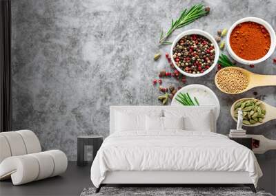 Assortment of aromatic organic spices and herbs on dark marble background. Long banner format. Healthy food concept. Wall mural