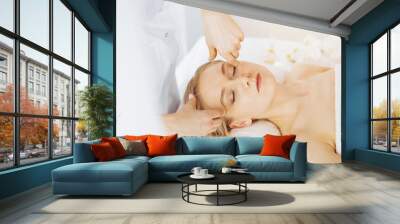 beautiful caucasian woman getting face depilation procedure. beauty and spa salon concept Wall mural