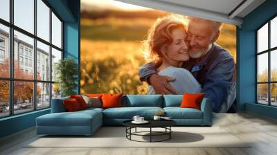 Beautiful elder couple together, hugging in a meadow at sunset, embodying love and togetherness Wall mural