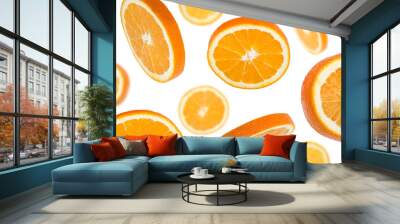 Close-up falling pieces of orange, isolated on white Wall mural