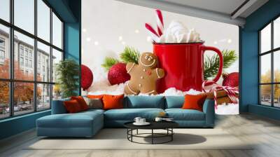 Cozy winter composition with a cup of hot chocolate with marshmallows gingerbread man cookies  on a light festive background. Wall mural