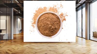 Dry yellow clay powder mask for face and body  in ceramic bowl isolated on white Wall mural