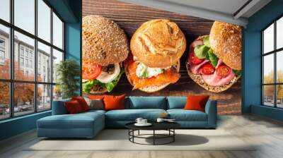 Assorted sandwiches on wooden background. Healthy food concept with copy space. Top view. Banner. Wall mural