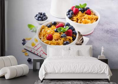 Corn flakes with berries and milk on light gray background. Copy space. Healthy breakfast concept. Wall mural