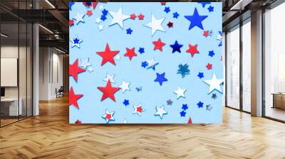 Patriotic banner - USA background with silver, red and blue stars shape sparkles on light blue. Festive background with copy space. Independence Day, Memorial Day and Flag Day celebration concept Wall mural