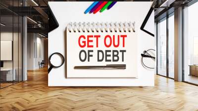 Notebook with Tools and Notes about Get Out Of Debt business concept Wall mural