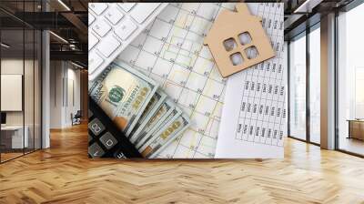 Paper business graphs with model of house,architectural plan, calculator and key,business Wall mural