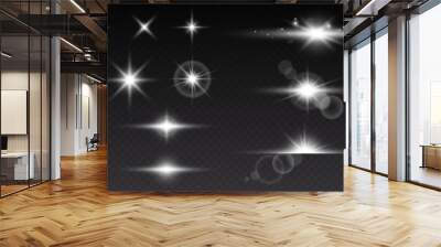 Realistic lens flares star lights and glow white elements on transparent background Wall mural