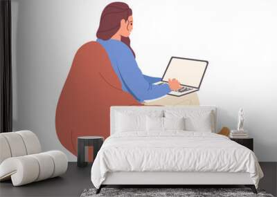 Side view on woman young character using laptop computer sitting on soft bag isolated on white Wall mural