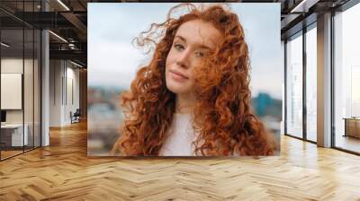 portrait of amazing young redhead lady exploring city   Wall mural