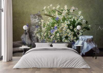 Still life with luxurious bouquet of field flowers and funny kitty Wall mural