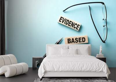 Text EBP Evidence-based practice concept on wooden block on the blue background Wall mural