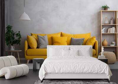 Yellow sofa with grey pillows near a blank white wall. Modern interior with contemporary furniture for mockup, wall art. Promotion background with copyspace. Wall mural