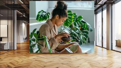 Young woman enjoying morning routine in bathrrom. Eco-friendly cleaning kit. Organic soap and jute washcloth in the woman's hand. Zero waste concept, plastic-free, eco-friendly shopping, vegan Wall mural