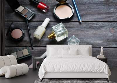 Decorative cosmetics for make-up on a wooden background. Beauty and fashion concept. Copy space, flat lay.
 Wall mural