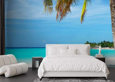 Panoramic view of a beautiful sunny day on sandy beach on exotic island. Wall mural