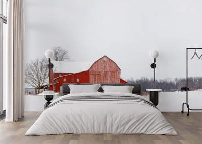 Red barn in the snow with horses in the pasture | Winter in Amish Country, Ohio Wall mural