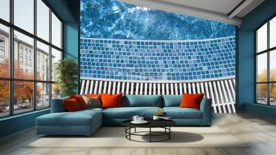 Edge of blue resort swimming pool Wall mural