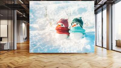 Two small snowmen the girl and the boy on snow, copy space. Greeting card for lovers, Christmas card Wall mural