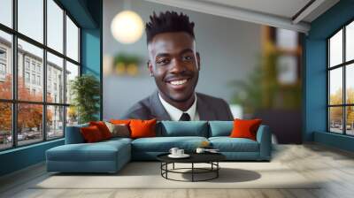 Portrait of a handsome smiling African American businessman in suit at office workplace, professional confident looking young business man at office, positive looking executive manager wearing blazer Wall mural