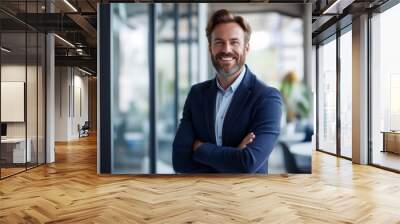 Portrait of a smiling handsome businessman, professional and confident looking man in suit at office, Successful matured businessman looking at camera, positive looking office manager wearing a jacket Wall mural