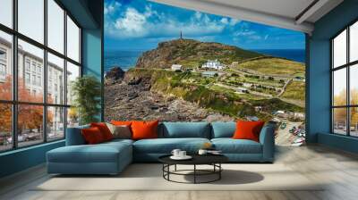 Coastal Landscape with Lighthouse and Rocky Shore in Tintagel, Cornwall, UK Wall mural