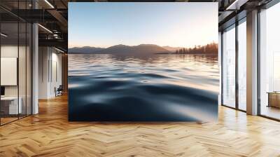 A calm lake with a beautiful sunset in the background Wall mural