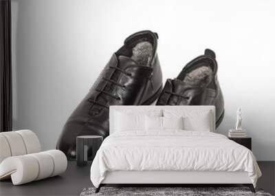 Men black winter leather boots with fur inside isolated on white background Wall mural