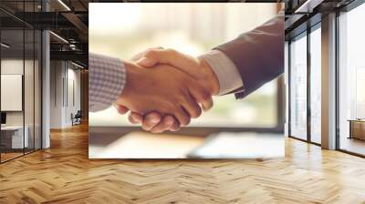 a professional handshake between two businessmen in a sunlit office, symbolizing partnership and agreement, suitable for corporate events. Wall mural