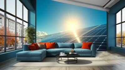 Solar panels under a bright sun with a clear blue sky symbolize sustainable energy solutions, ideal for Earth Day or environmental themes. Wall mural