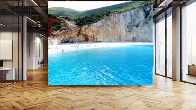 Porto Katsiki beach natural landscape and seascape with island, cliff, rock, plant, sea cave, blue sky, and sunray. Travel destination in western Greece of Ionian Islands, Lefkas, Kefalonia, Meganisi  Wall mural