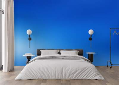 Wide gradient blurred banner bright blue. Backdrop for product display cobalt blue. Empty background wall. Wall mural