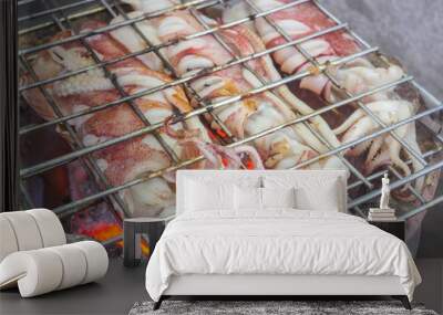 The Grilled squid,Three Grilled squid on gridiron,Delicious bar b Que sea food. Wall mural