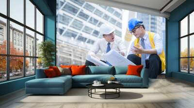 two business man construction site engineer look blueprint Wall mural