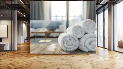 White towels rolled on table for product display montage. Wall mural