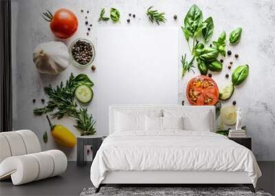 A flat lay of fresh vegetables and herbs surrounding a blank sheet of paper for design purposes. Wall mural