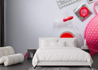 female accessories and contraceptives on a white background with space for text Wall mural