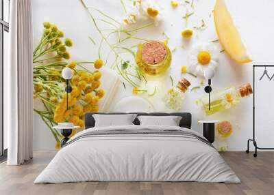 herbal cosmetics with wild flowers on a white background Wall mural