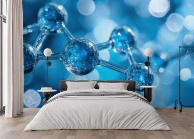 A blue and silver molecule is shown in a blurry image Wall mural