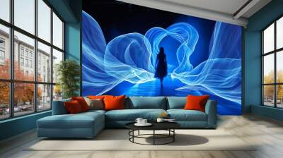 A blue wave of light is projected onto a dark background Wall mural