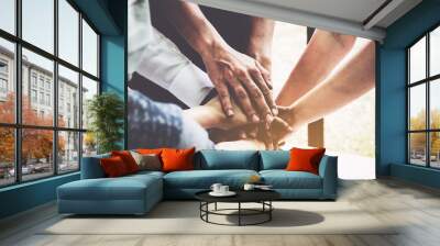 group of business people putting their hands working together on wooden background in office. group  Wall mural