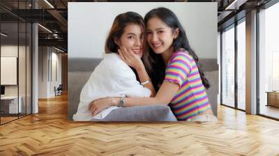 Young Asian Women LGBT lesbian couple love moments happiness at bedroom. LGBTQ or Gay and pride concpet. Wall mural